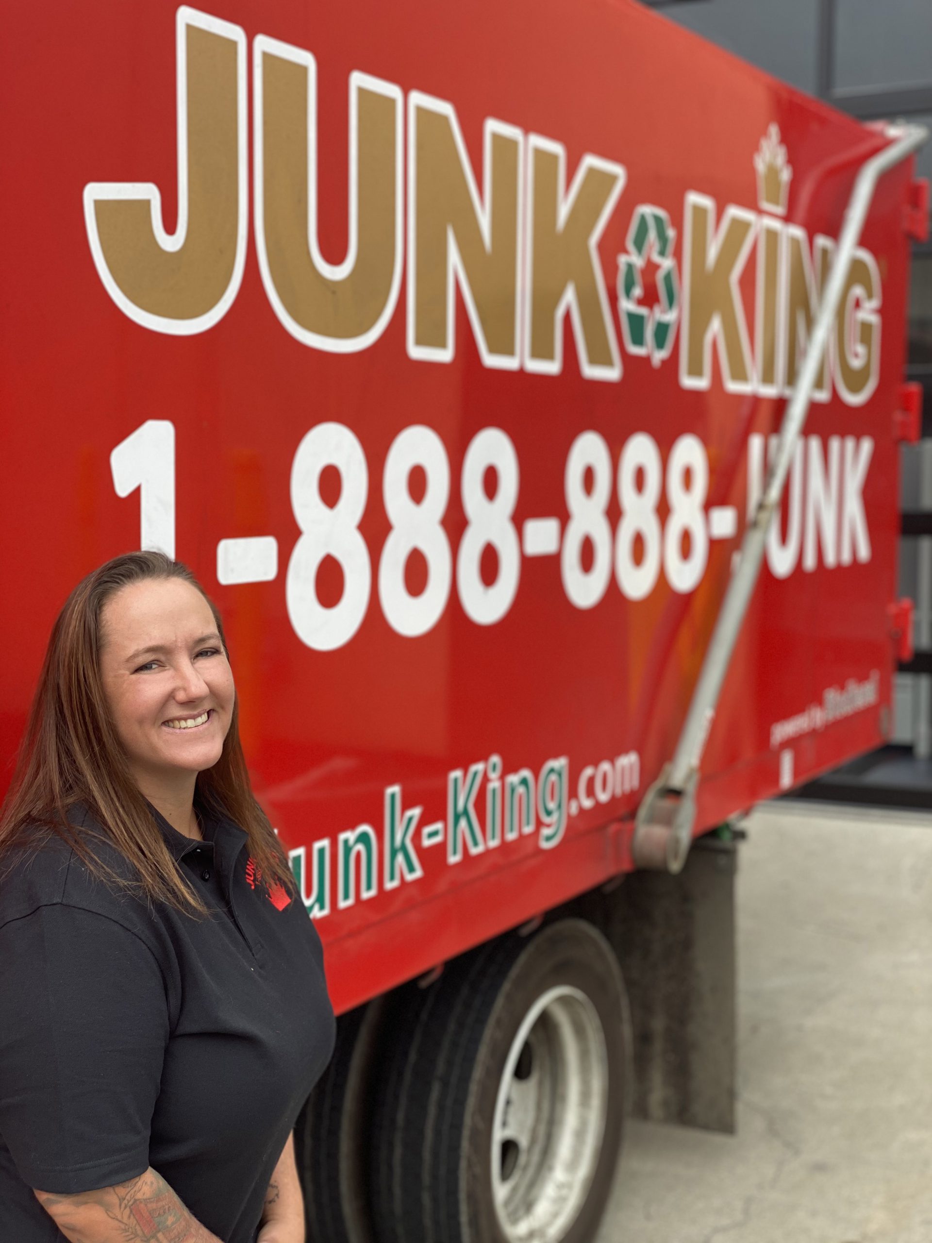 crissyrussotruck_use-this-one-scaled crissy in front of a junk king truck in wake forest