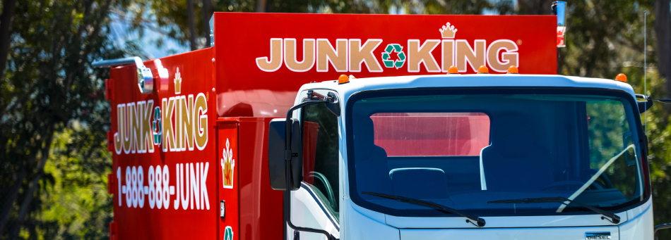 junk removal truck pulling up to a job in franklinton nc